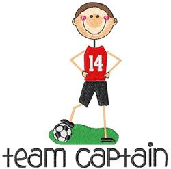 Cheerful boy in a red jersey with the number 14 stands confidently by a soccer ball on green grass.