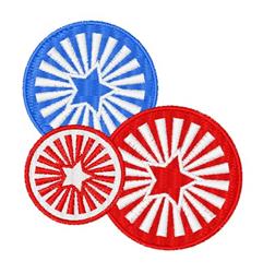 Circular applique patches with bold star designs in vibrant red and blue, celebrating patriotic holidays.