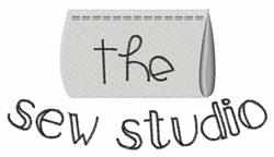 Whimsical textile label featuring 'the sew studio' in curved, playful script on a light gray background.