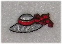 Stylish wide-brim hat in gray with a vibrant red ribbon and floral embellishments, perfect for spring fashion.