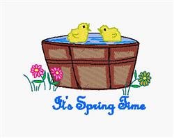 Two yellow ducklings swim in a brown tub filled with water, surrounded by vibrant pink and green flowers. Cheerful spring sce