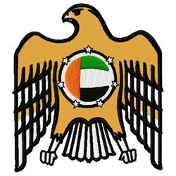 Applique eagle with golden brown wings and a flag-colored circle featuring green, white, and black.