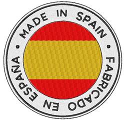 Spanish flag patch in circular embroidered style featuring bold red and yellow stripes with 'MADE IN SPAIN' text.