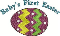 Colorful Easter egg with zigzag patterns and polka dots, featuring 'Baby's First Easter' in blue, perfect for festive decor.