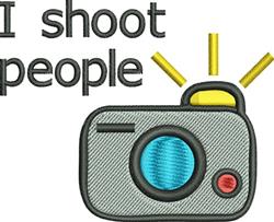 Humorous camera design with a blue lens and red button, featuring the text 'I shoot people' in playful style.