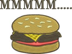 Playful cheeseburger with vibrant toppings and 'MMMMM....' text, perfect for kitchen decor.