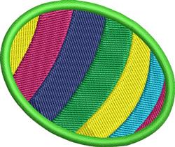 Colorful oval patch with multicolored stripes and a green border, embodying a playful spring theme.