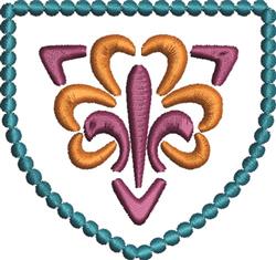 Colorful fleur-de-lis applique in purple and orange, framed by a blue scalloped border, showcasing symmetrical design.