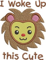 Cartoon lion face with a yellow center, brown mane, and pink ears, featuring text 'I Woke Up this Cute'.