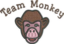 Playful monkey head with brown fur and a pink face, featuring 'Team Monkey' text above, perfect for colorful team apparel.