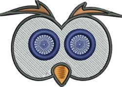Playful owl face with large blue eyes, light body, and orange beak in a cartoon style.