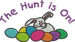 Playful rabbit with large ears among colorful eggs, featuring vibrant hues for Easter festivities.