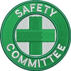 Safety patch featuring a green circular design, a white cross, and bold white text reading 'SAFETY COMMITTEE'.