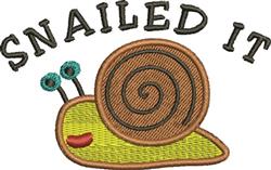 Cheerful snail with a spiral shell and blue eyes, above the text 'SNAILED IT' in bold, playful style.