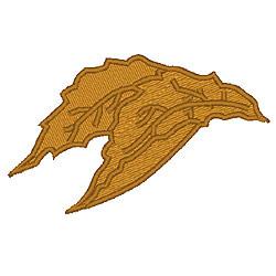 Applique leaf in warm golden hues features intricate vein details and an organic shape, perfect for autumn decor.