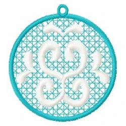 Ornamental circular charm with intricate turquoise scroll patterns on a grid background, adding a whimsical touch.
