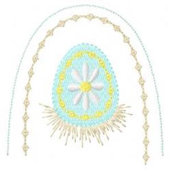 Easter egg with light blue background, white flower, yellow petals, and golden fringes for festive spring decor.