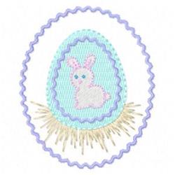 Easter egg with bunny in pastel blue, adorned with a lavender scalloped border and light fringe, perfect for spring.