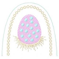 Playful decorative egg in pink with blue dots and a charming border, perfect for Easter festivity.