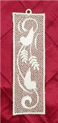 FSL decorative lace panel featuring intricate white lace with stylized birds and swirling leaves on a rich red background.