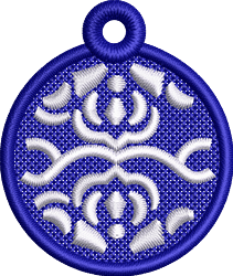 FSL decorative tag with a rich blue background and intricate white embroidery patterns in a circular shape.