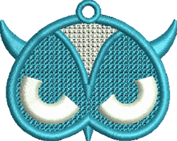 FSL owl face design in teal with playful large eyes and sharp angles, set against a transparent backdrop.