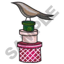 Whimsical bird in soft browns on a colorful stack of gift boxes in green, pink, and red.