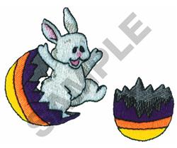 Cartoon bunny in shades of gray joyfully jumping from a broken, colorful egg shell, perfect for Easter.