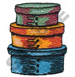 Stack of three colorful circular containers: green, orange, and blue with textured surfaces and stitching details.
