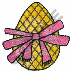 Decorative yellow egg with a diamond pattern and pink ribbon for Easter, perfect for cheerful spring decor.