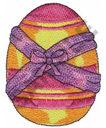 A colorful decorative Easter egg with vibrant stripes of pink, yellow, orange, and purple, wrapped in a purple bow.