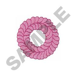 Decorative stitched design featuring a circular loop pattern in elegant pink stitching on a white backdrop.