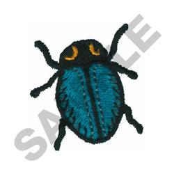 Applique bug with a vibrant teal body, playful yellow eyes, and a charming black outline.