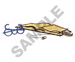 Realistic sewing supplies include a rich blue spool of thread, thimble, and needle on yellowed fabric.