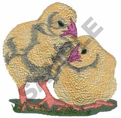Two fluffy yellow chicks sit on vibrant green grass with pink beaks, showcasing a cute and realistic scene.