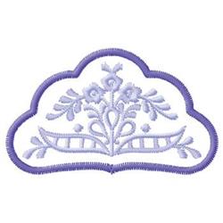Decorative floral motif featuring intricate patterns and a light purple outline, with elegant curved shapes.