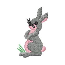Cute grey rabbit with pink accents in a playful pose, surrounded by green grass for Easter-themed projects.
