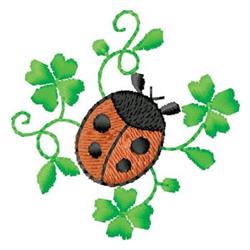 Colorful ladybug appliqued with black spots among green clovers and vines, vibrant spring theme.