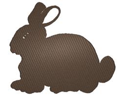 Minimalist brown rabbit silhouette with smooth outline and small ear detail, perfect for Easter decor.