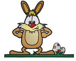 Cartoon rabbit with playful expression beside a colorful egg on green grass, perfect for Easter themes.