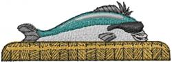 Whimsical fish in vibrant teal and white, resting on straw-like surface, showcasing detailed fins and tail.