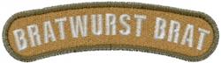 Embroidered patch featuring 'BRATWURST BRAT' in bold white on a tan background, simple and playful design.