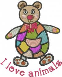 Colorful applique bear with a smiling face and bow, featuring patchwork design and 'I love animals' text.