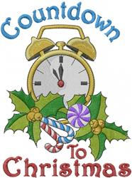 Vintage alarm clock with yellow finish, surrounded by holly and vibrant candy, perfect for Christmas décor.
