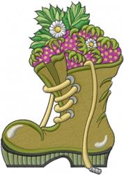 Whimsical boot overflowing with pink and white flowers, glossy green finish, perfect for spring gardening.