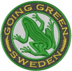 Colorful patch featuring a vibrant green frog with bold circular dark green border and yellow text 'GOING GREEN' and 'SWEDEN'