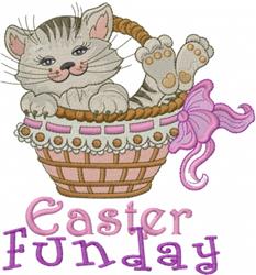 Playful kitten in a woven Easter basket with colorful decorations and a pink ribbon. Perfect for festive machine embroidery.