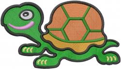 Playful cartoon turtle with a vibrant green body, brown shell, and a big smile, designed for machine embroidery.