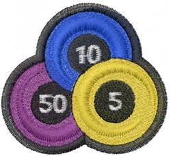 Three colored chips in vibrant purple, blue, and yellow arranged in a playful triangular formation.