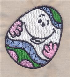Colorful smiling Easter egg with pink, blue, and green patterns, outlined in dark thread, celebrating Easter.